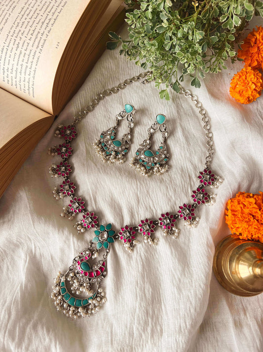 Samruddhi silver necklace set with turquoise and ruby pink kundan