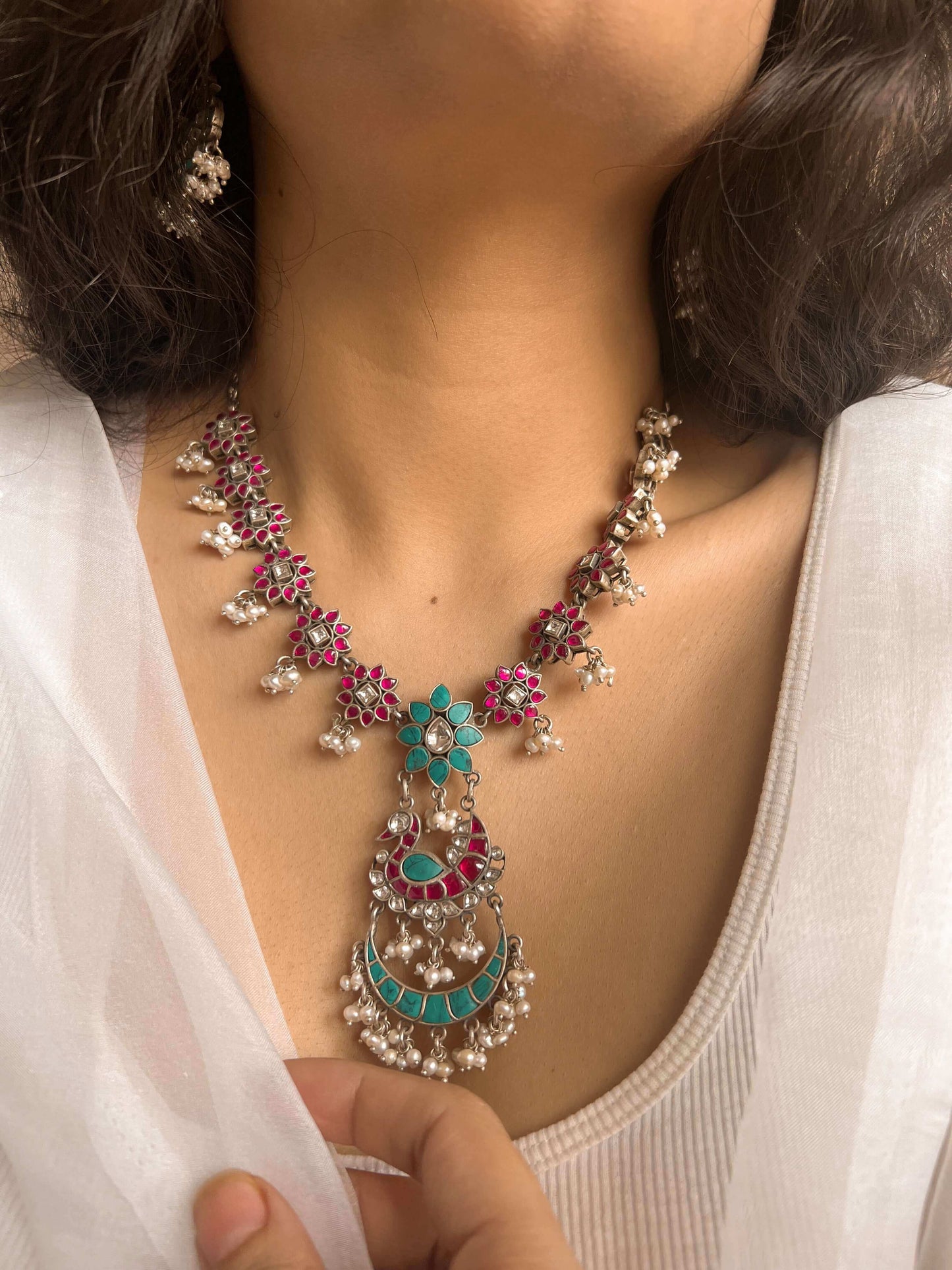 Samruddhi silver necklace set with turquoise and ruby pink kundan