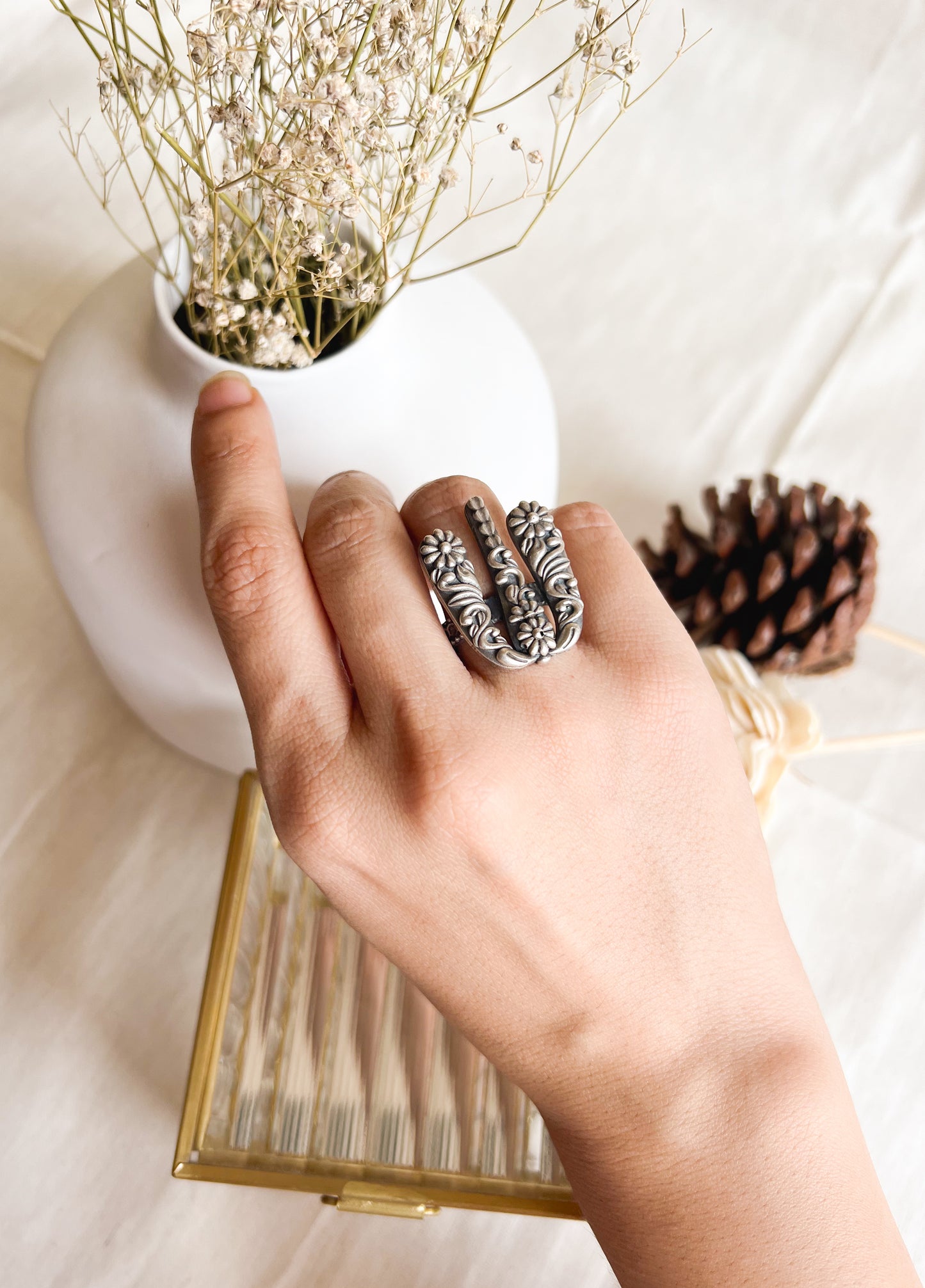 Mrida oxidised silver ring with floral embossing