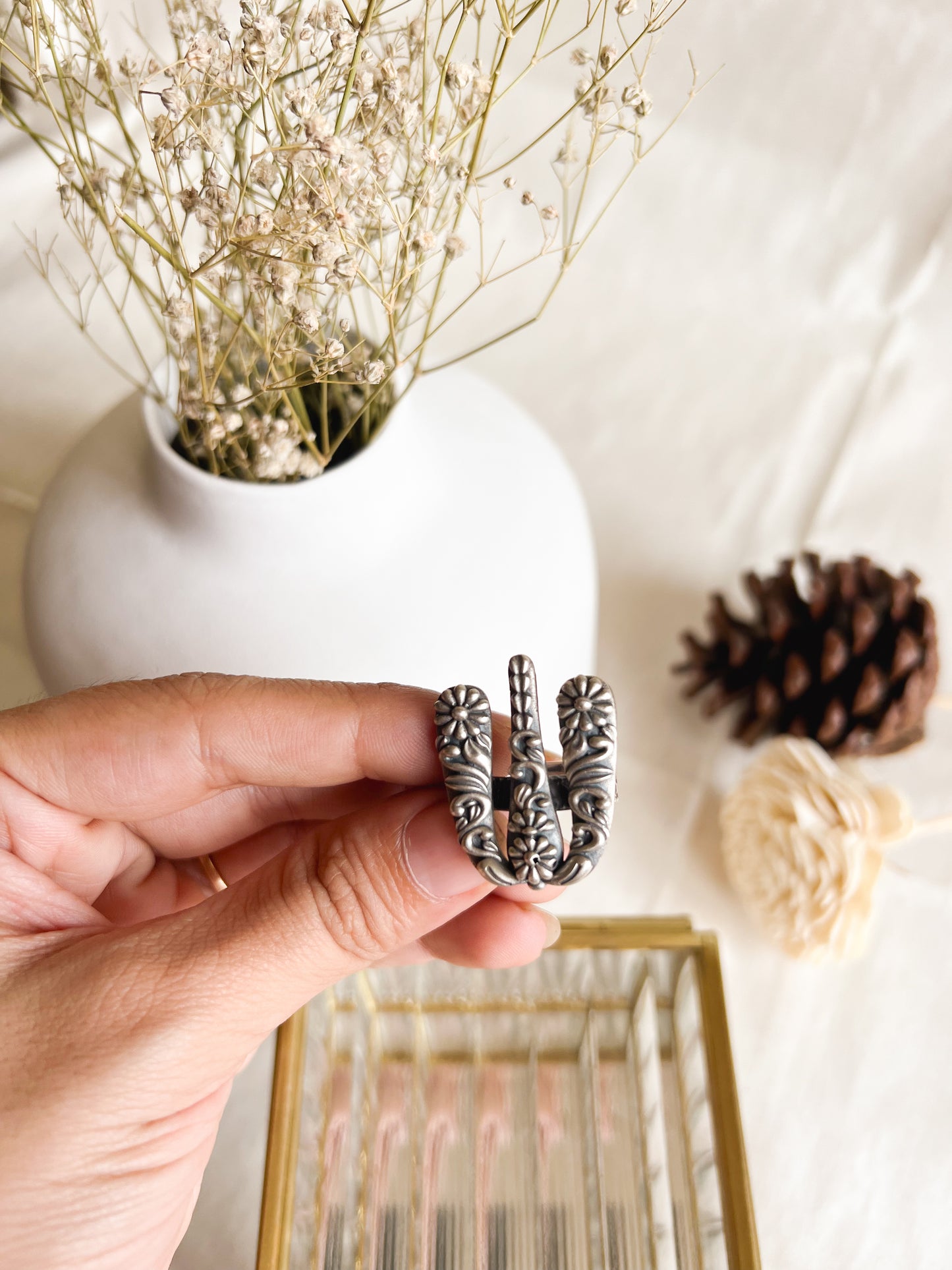 Mrida oxidised silver ring with floral embossing