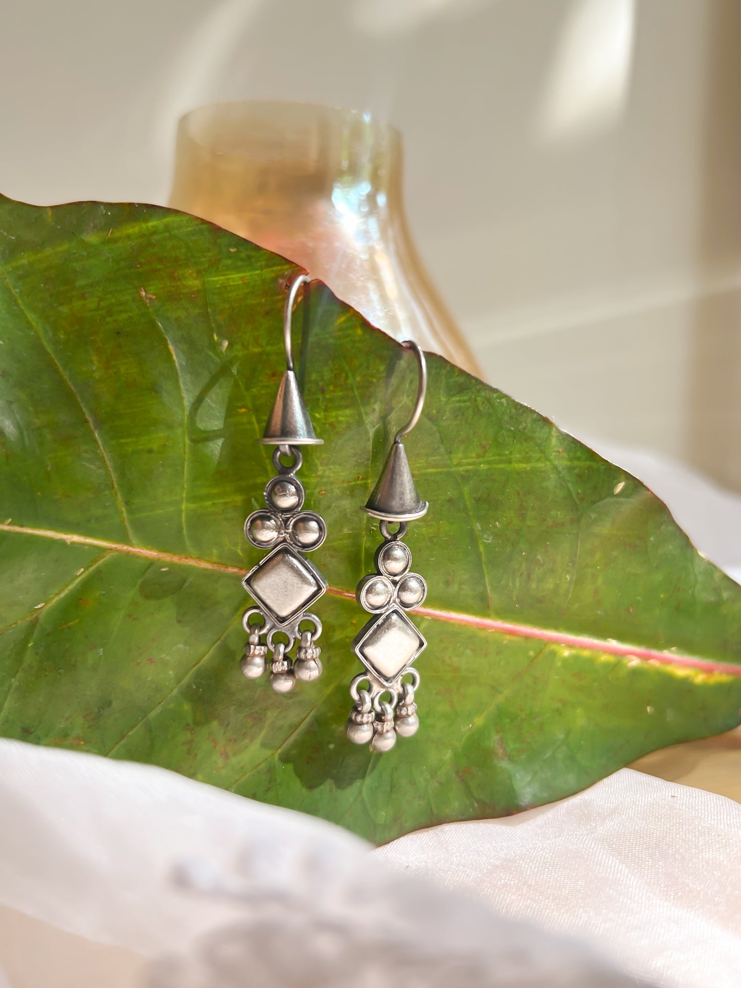 Trajva fish hook earrings with ghunghroo detail