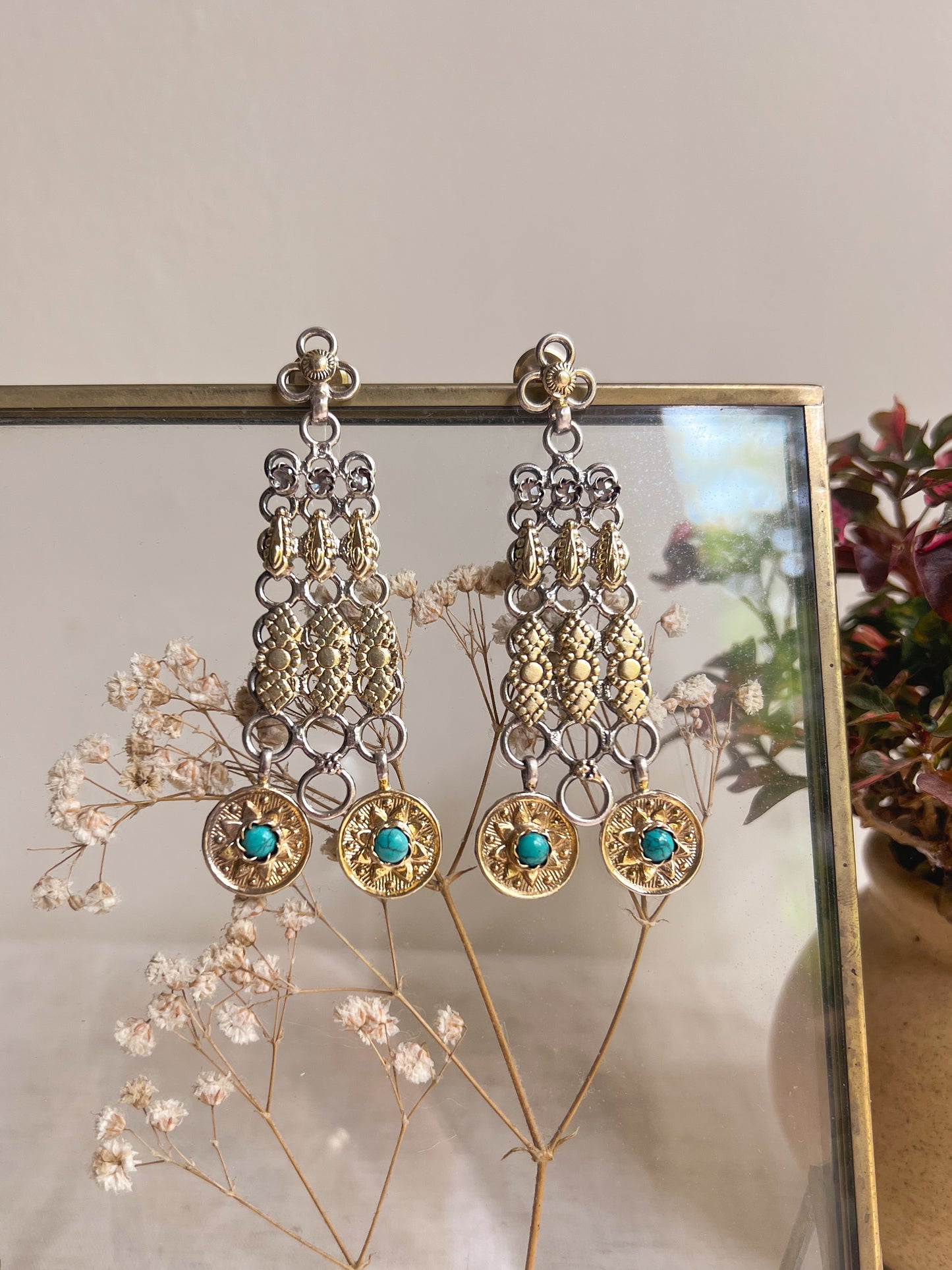 Mudra dual tone silver danglers with turquoise stones