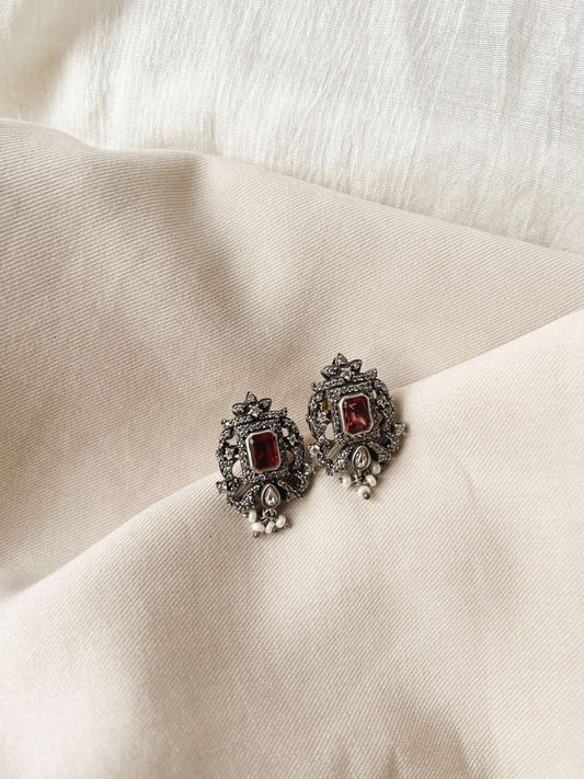 Victoria silver studs with zircon frosting and ruby onyx