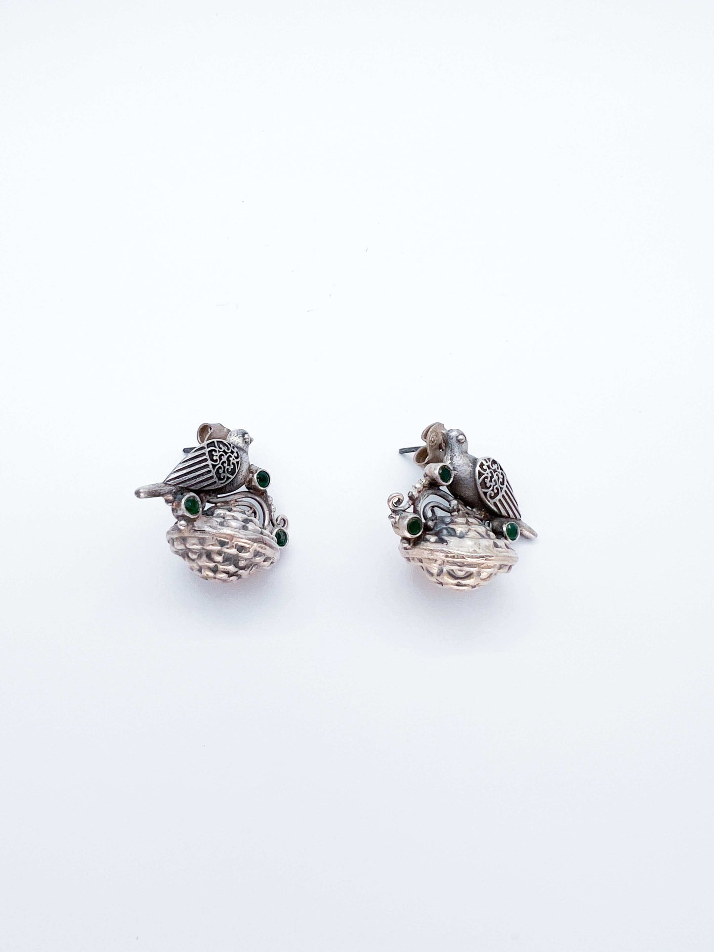 Vanya oxidised silver earring with bird motif and emerald stone
