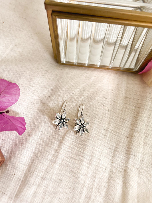 Keerat fish hook earrings in silver with kundan flower (2 color variants)