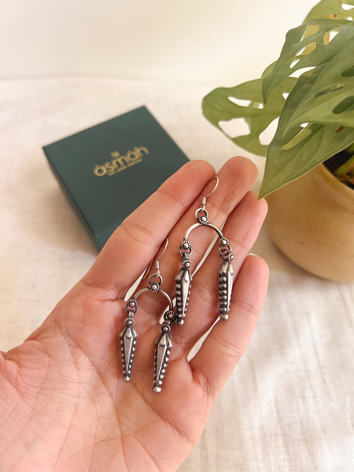 Arka fish hooks in oxidised silver