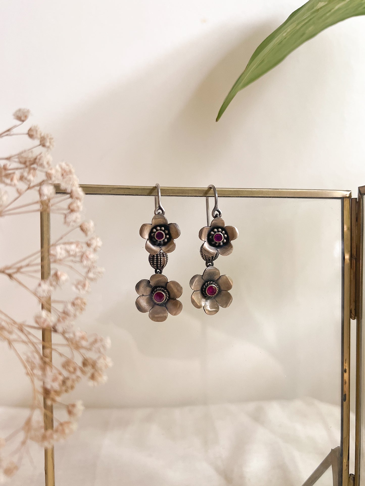 Nitara needle danglers with flower motifs