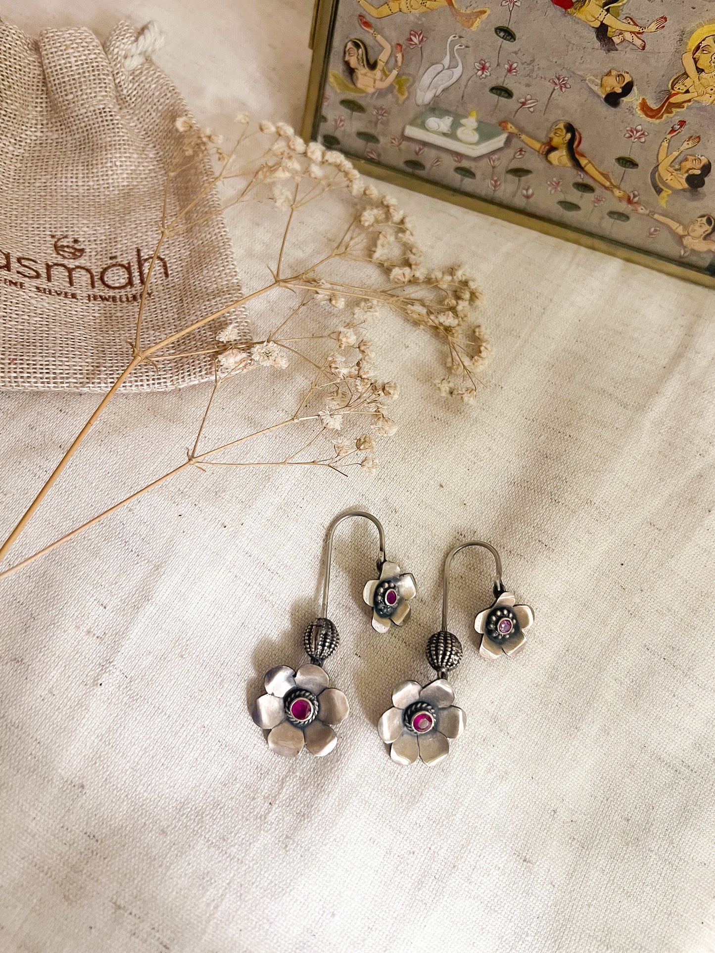 Nitara needle danglers with flower motifs