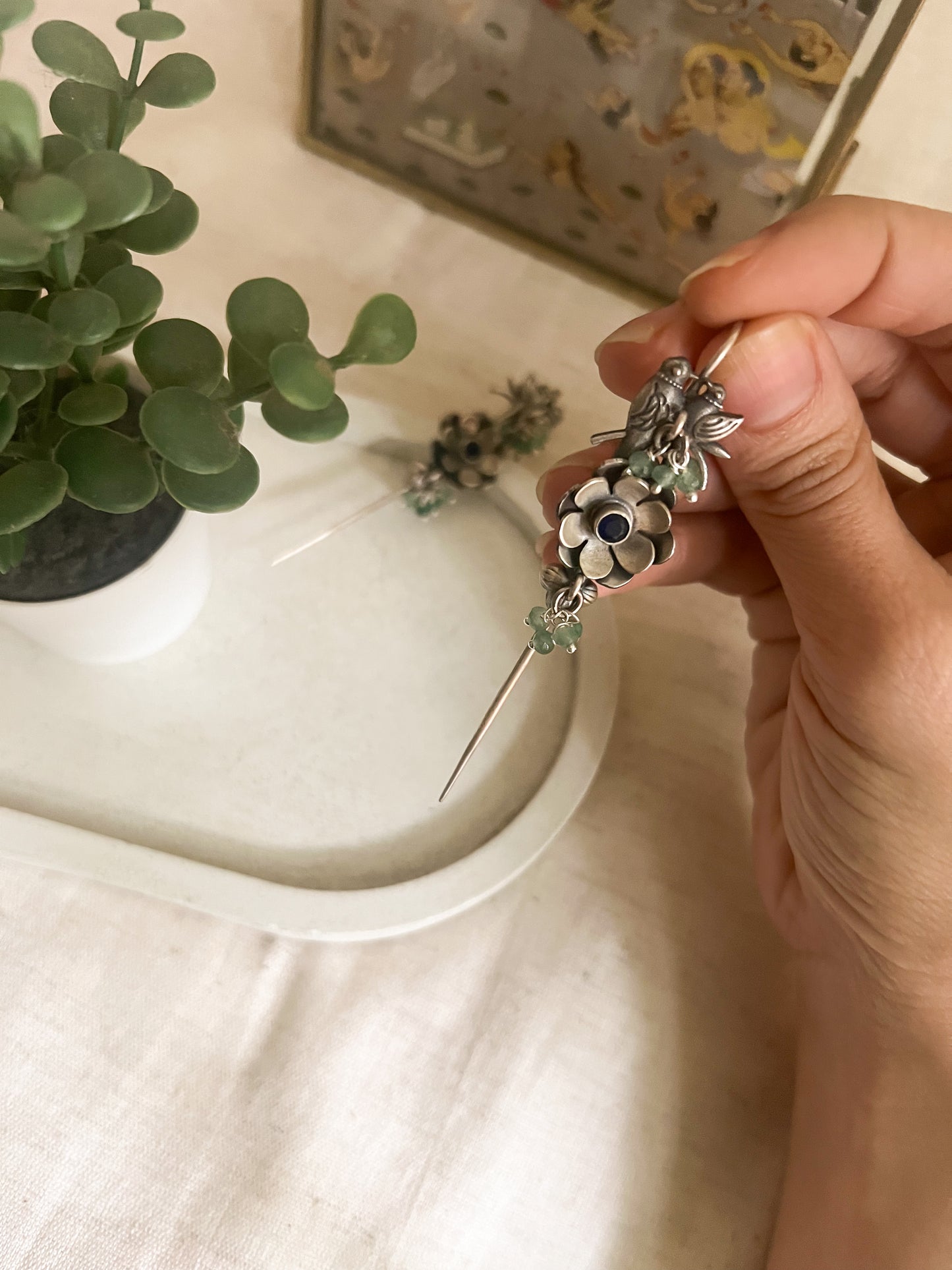 Keerat needle earcuff in silver with floral lovebird motif