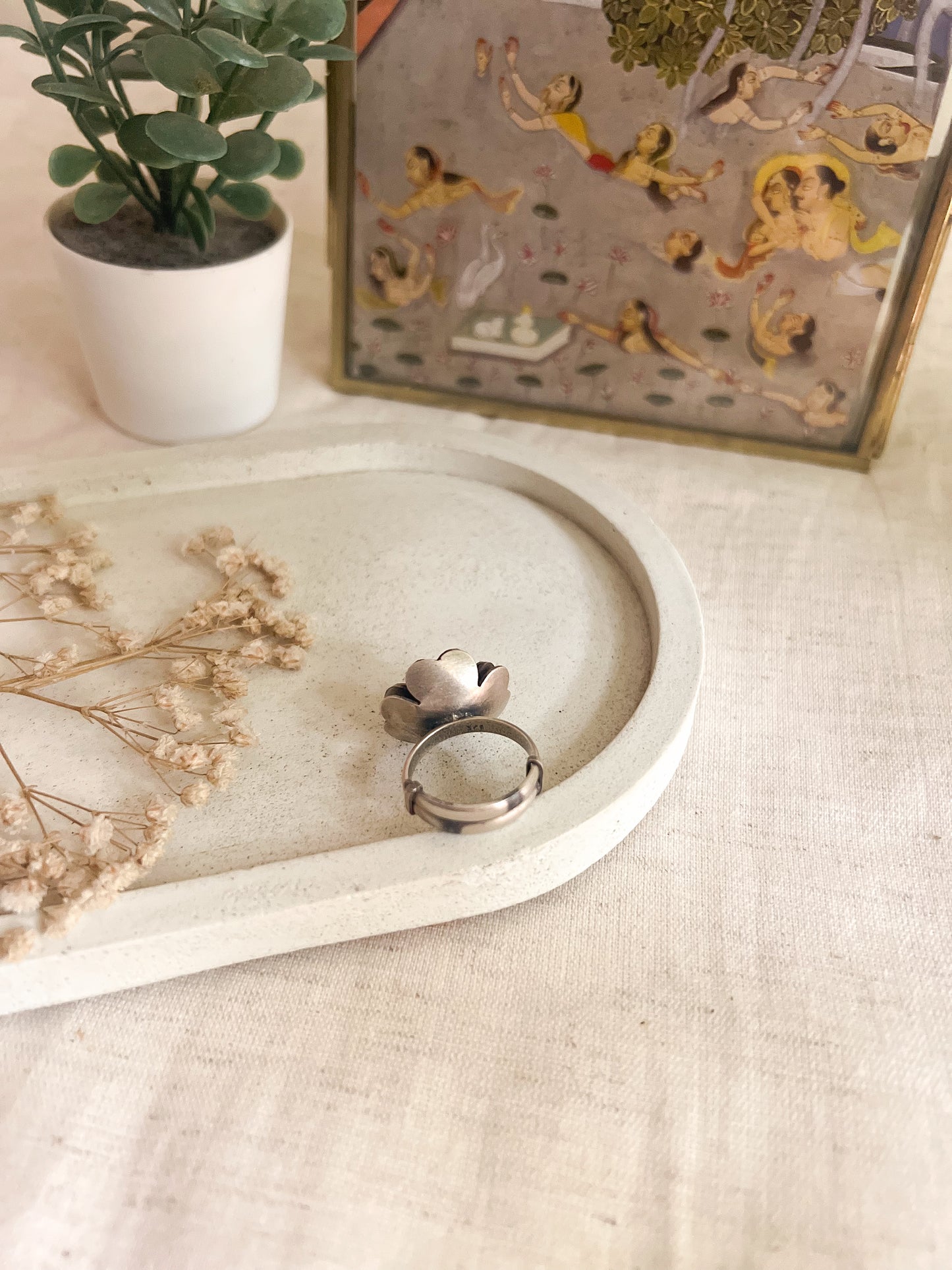 Zoya flower ring in oxidised silver with green stone (adjustable)