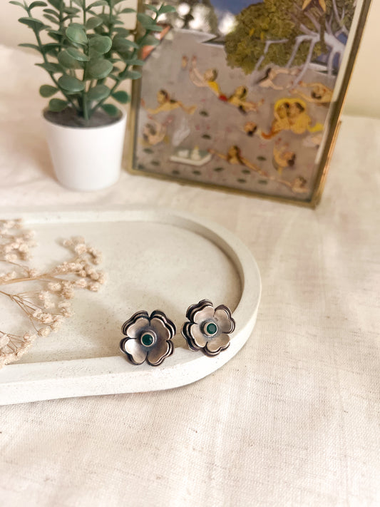 Zoya flower studs in oxidised silver with green stone