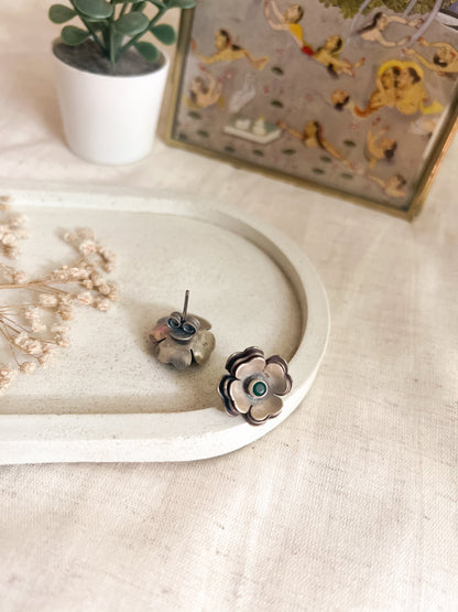 Zoya flower studs in oxidised silver with green stone