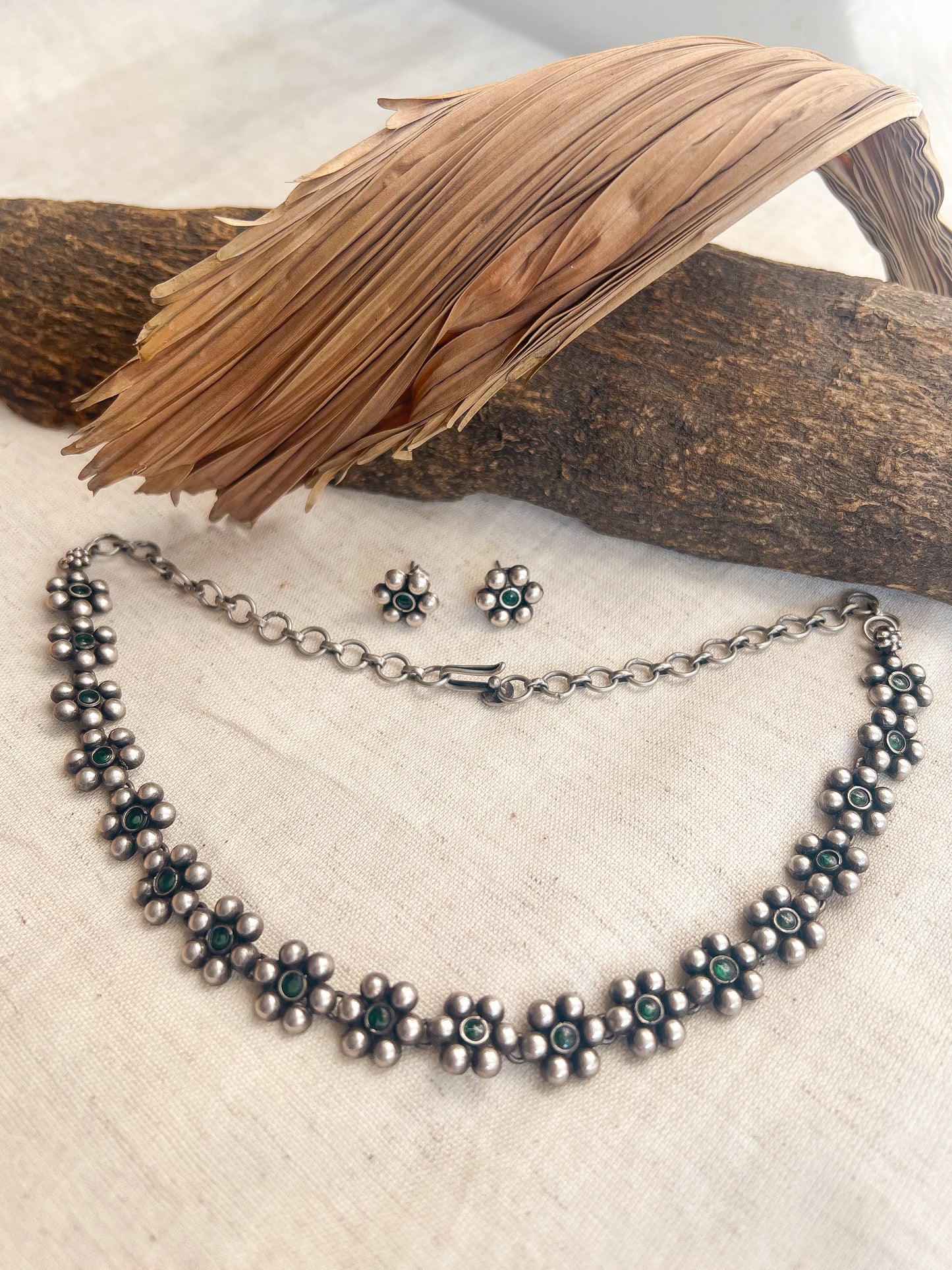 Devina oxidised silver necklace set with flower charm