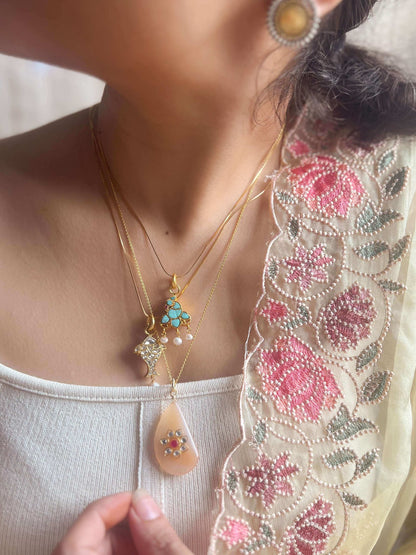Charvi gold plated peacock motif pendant in turquoise stone (without chain)