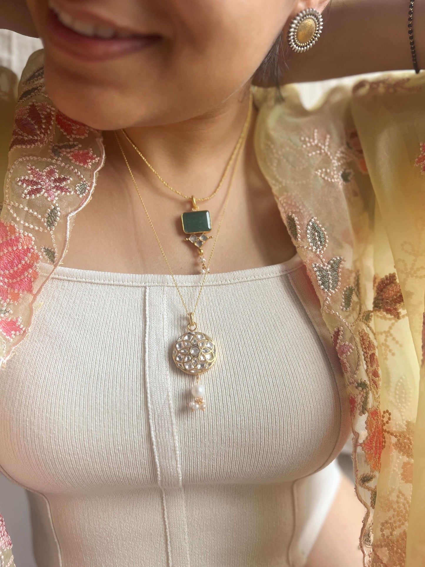 Abha gold plated silver neckchain with polki pendant
