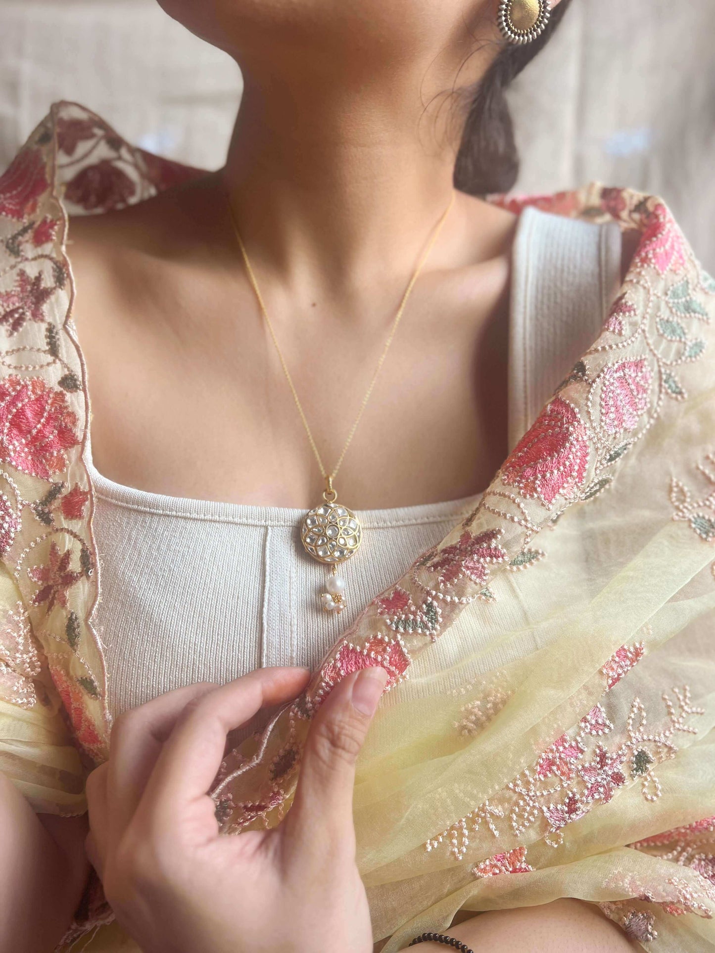 Abha gold plated silver neckchain with polki pendant