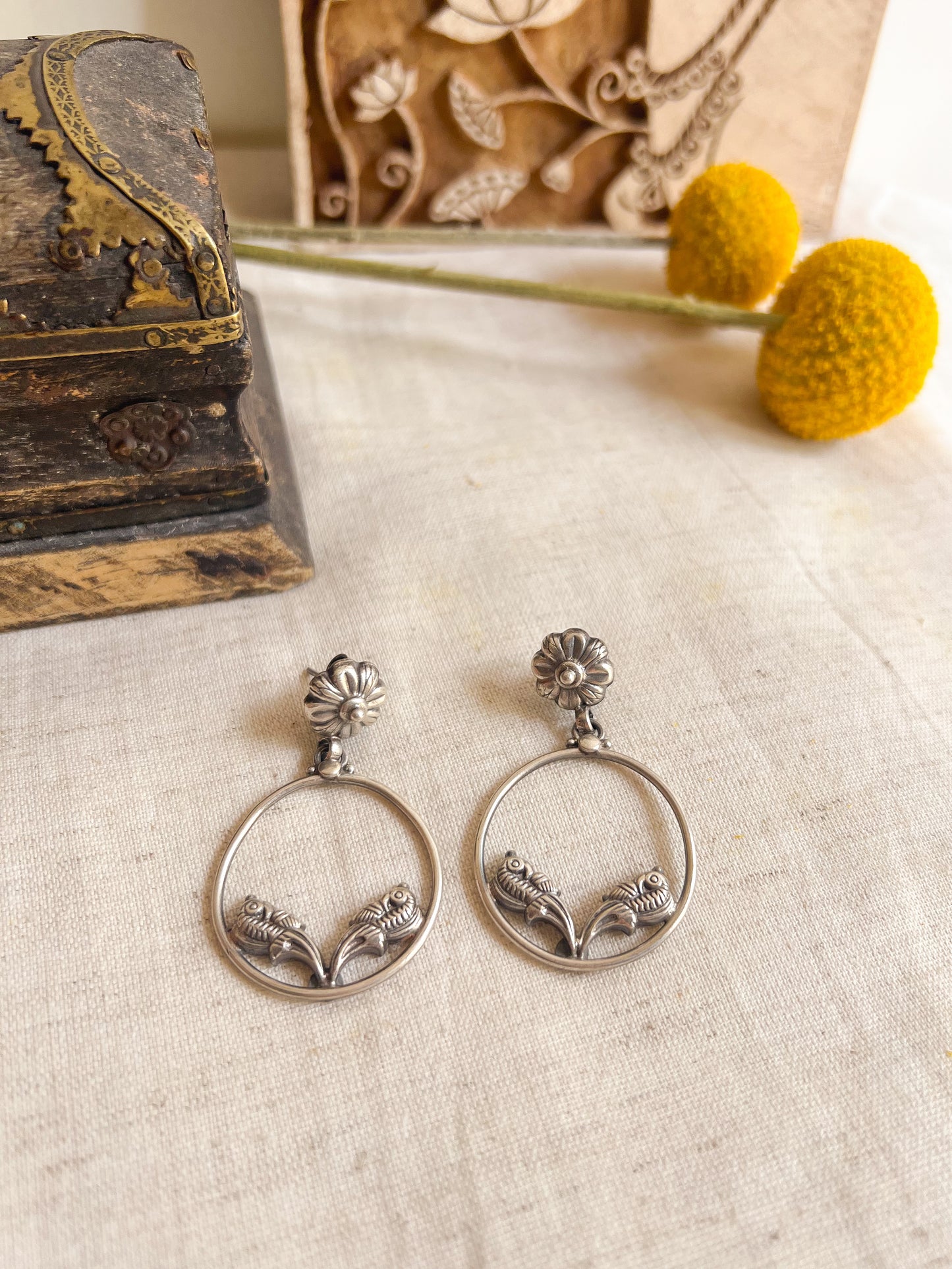 Panchi dangler in silver with bird motif