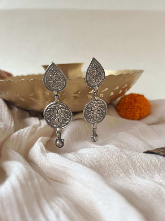 Kali oxidised silver earring with flower embossing