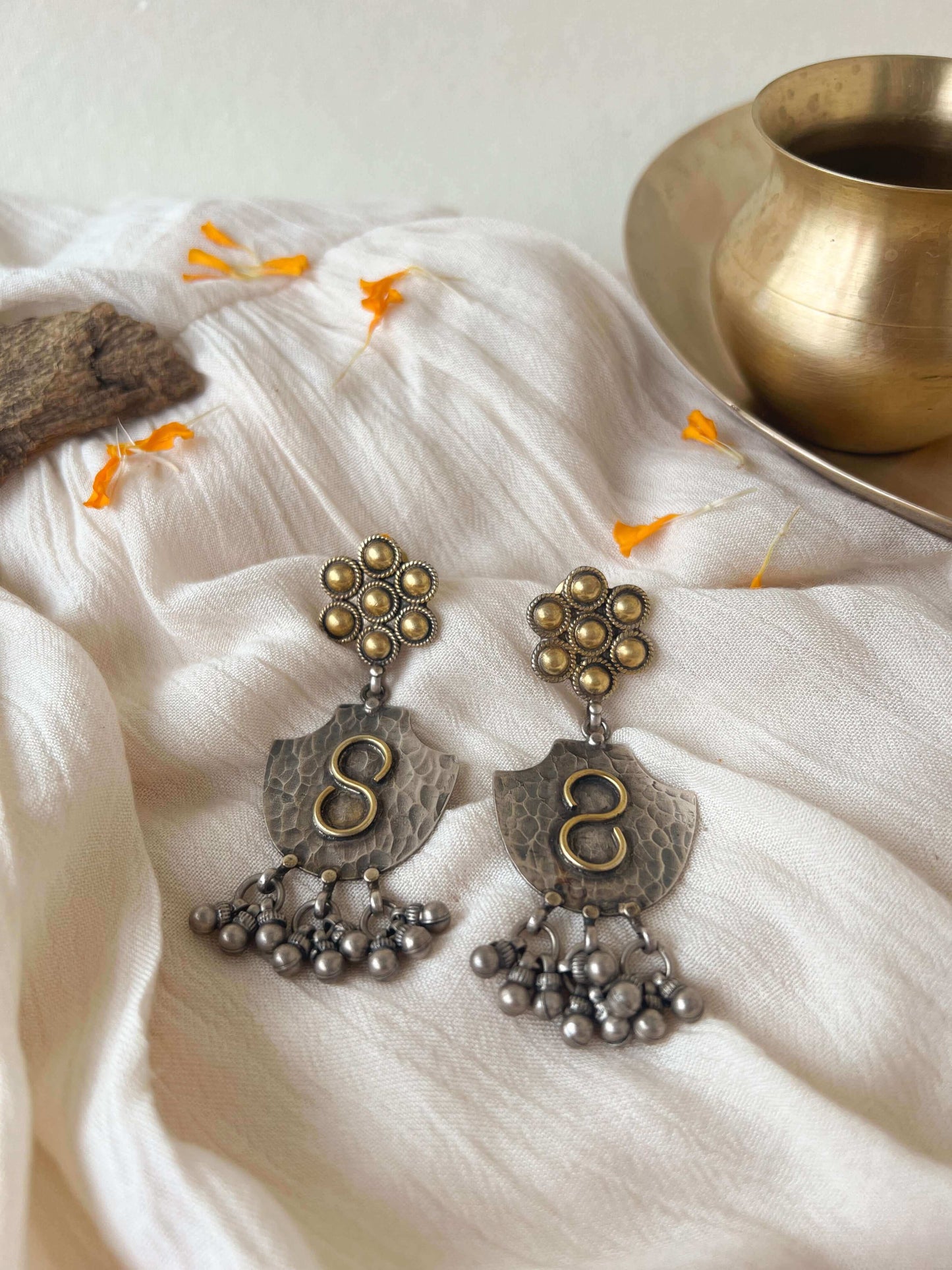 Raksha dual tone earrings with ghunghroo detail