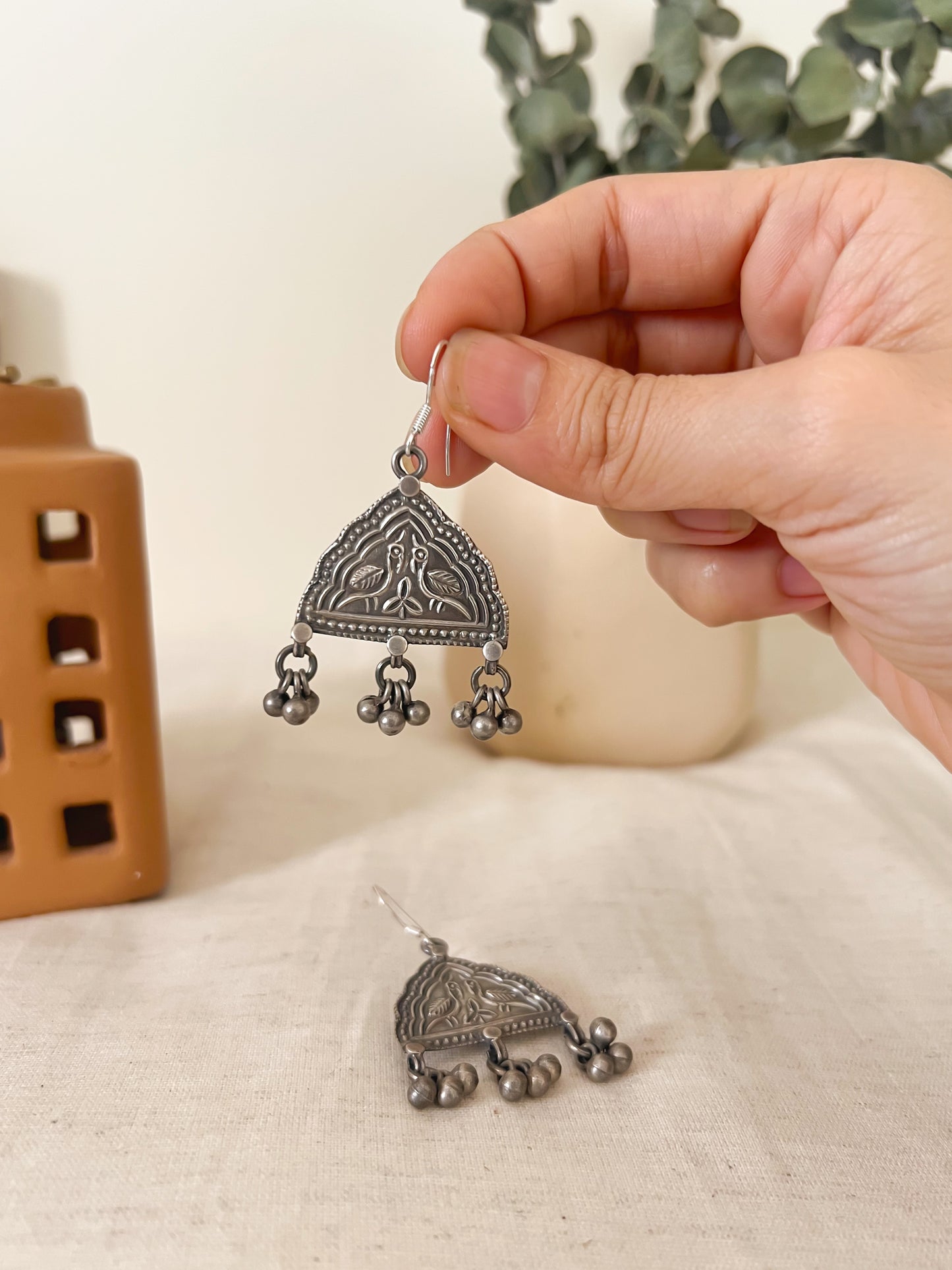 Toran earrings with ghunghroo detail in oxidised silver