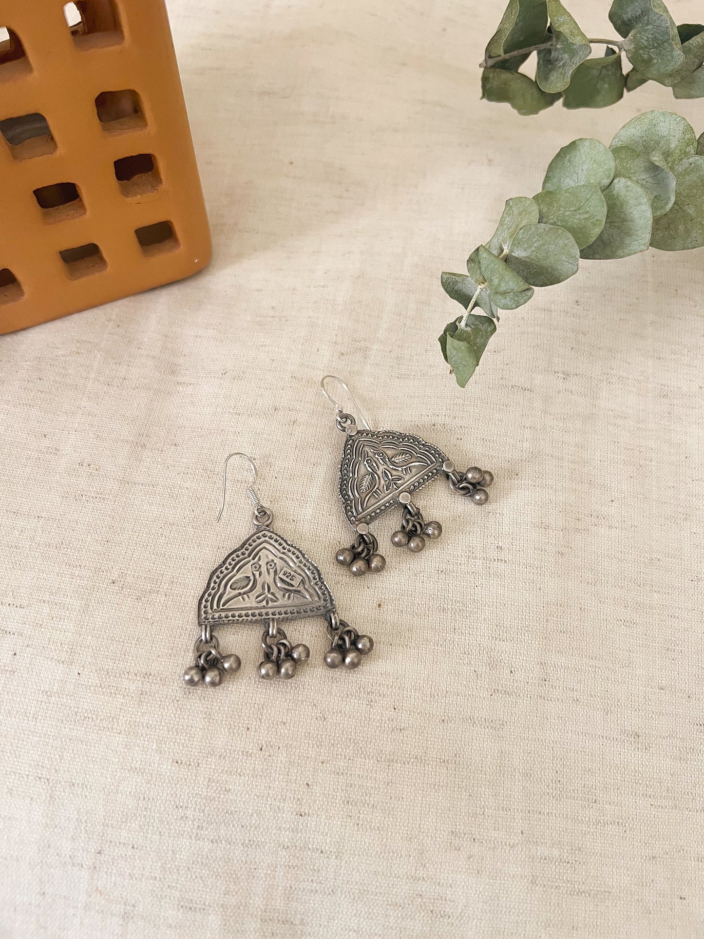 Toran earrings with ghunghroo detail in oxidised silver