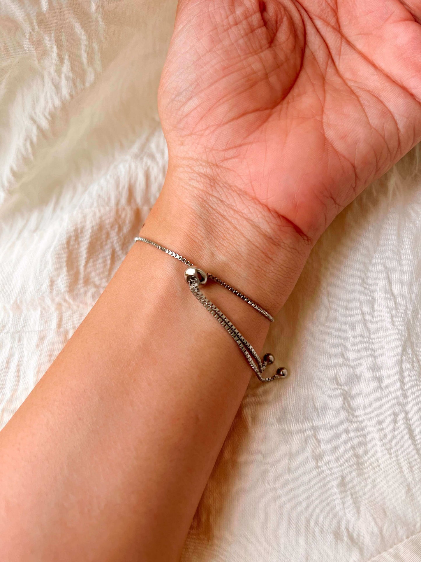 Infinity silver bracelet with zirconia