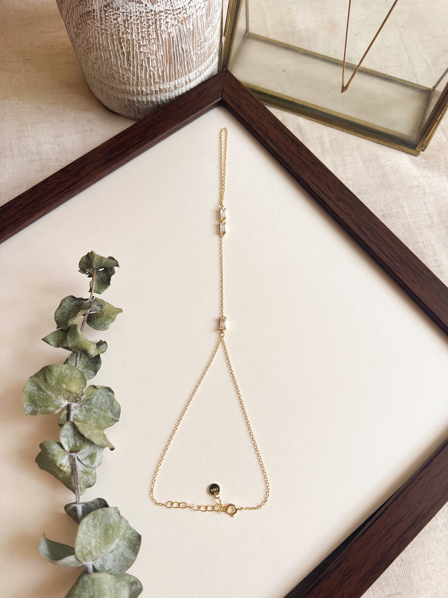 Lino 18K gold plated hand chain in sterling silver with zircon detail