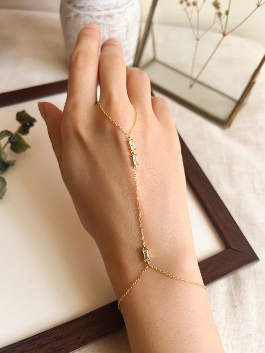 Lino 18K gold plated hand chain in sterling silver with zircon detail