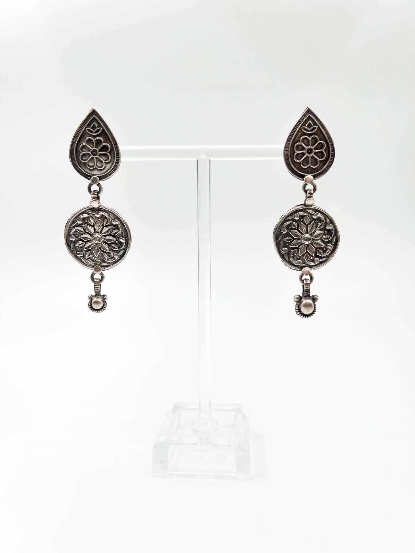 Kali oxidised silver earring with flower embossing