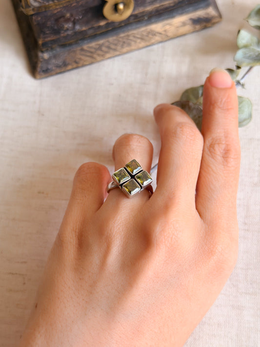 Sharanya ring with lime green quad in silver ( adjustable)