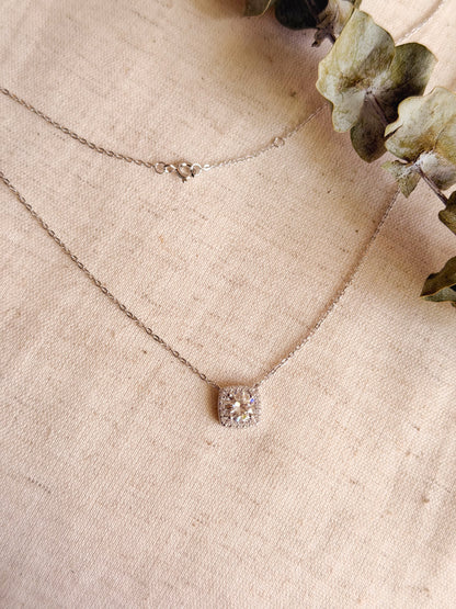 Cubic silver chain with zircon solitaire.