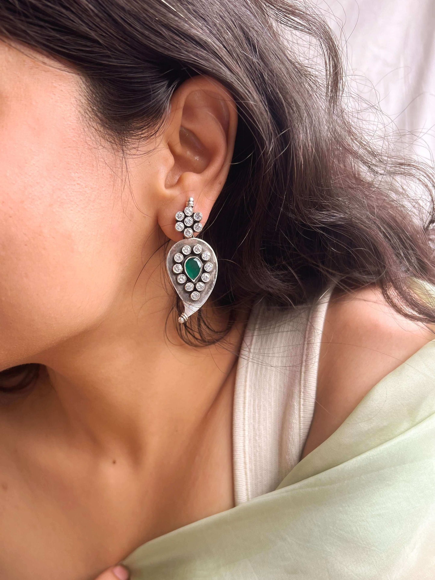 Ambika silver earring with zircon and emerald stone