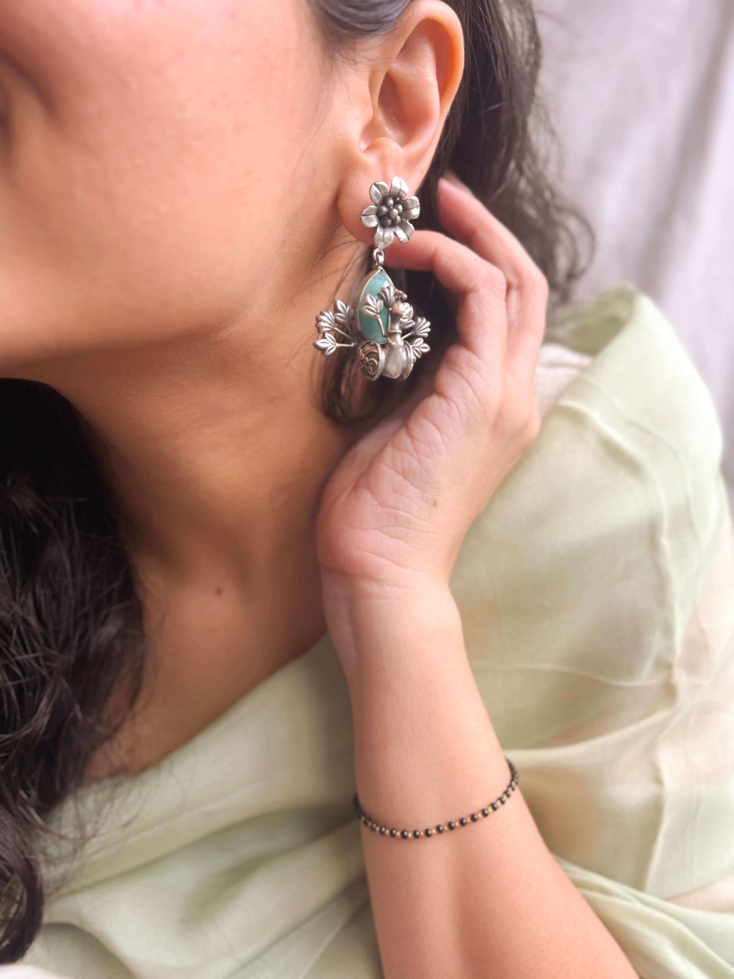 Saira oxidised silver peacock earring with blue chalcedony