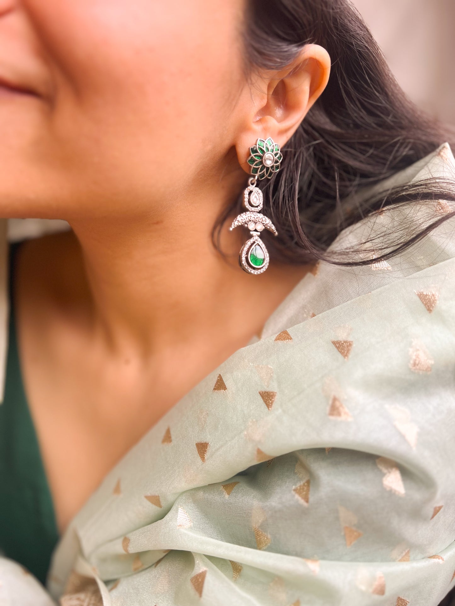 Nainika oxidised silver earring with emerald kundan stone